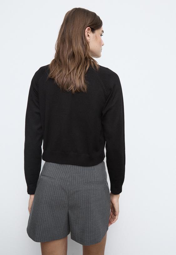 chaqueta punto botones manga ranglan