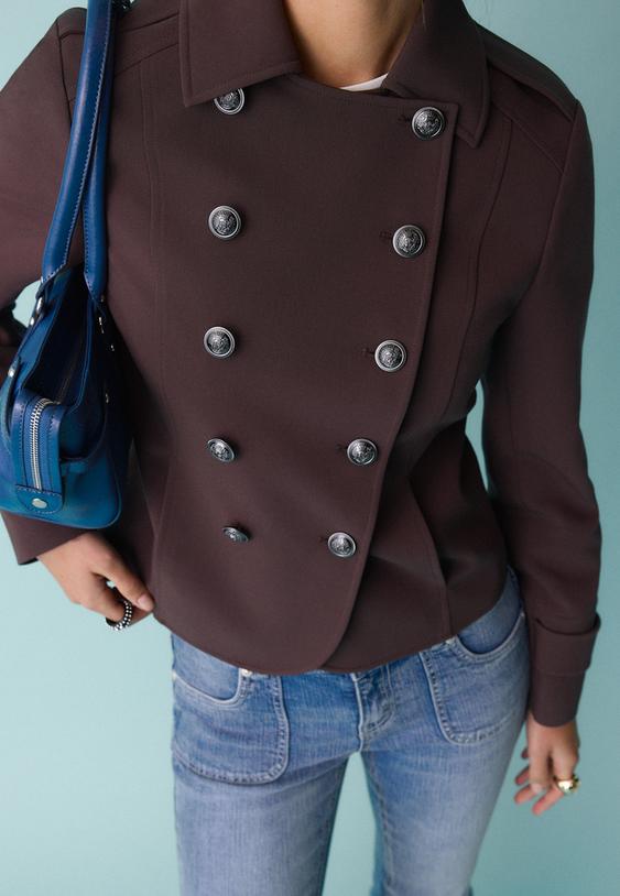 colbert met gegraveerde knopen