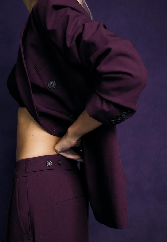 pantaloni eleganti wide leg con bottoni regolabili