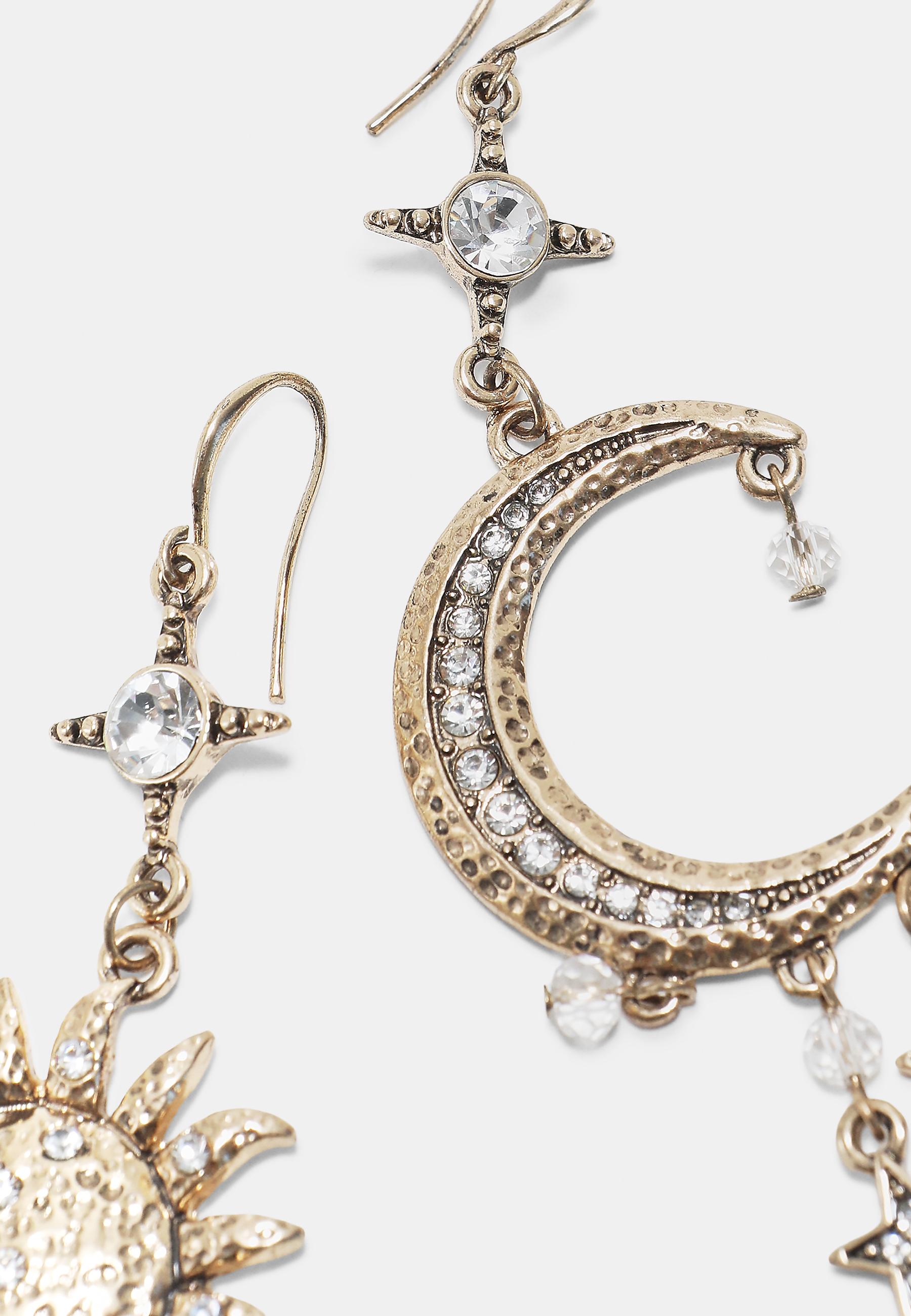 Mismatched sun and moon earrings — Gold