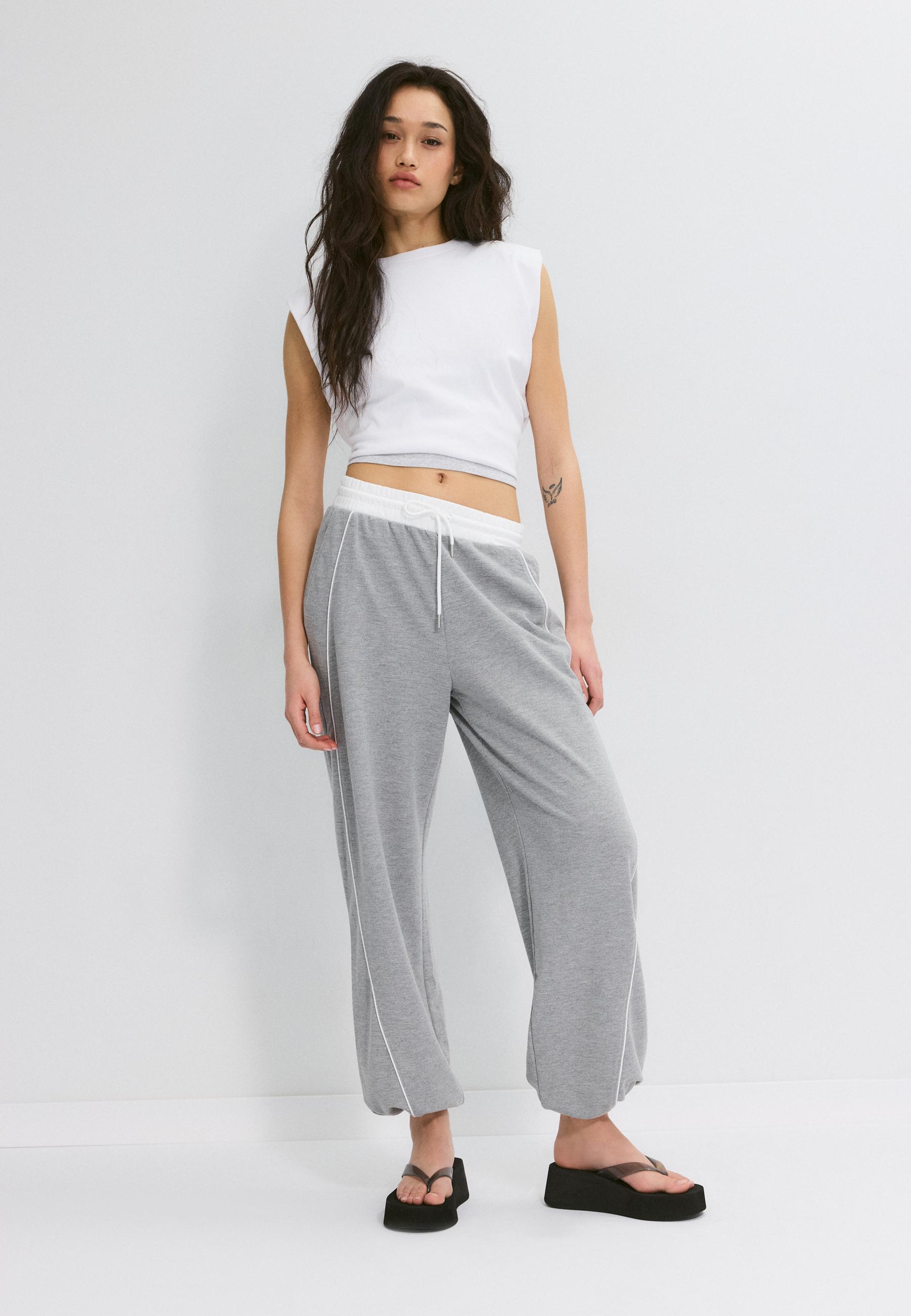 Jogger trousers with stoppers — Grey melange