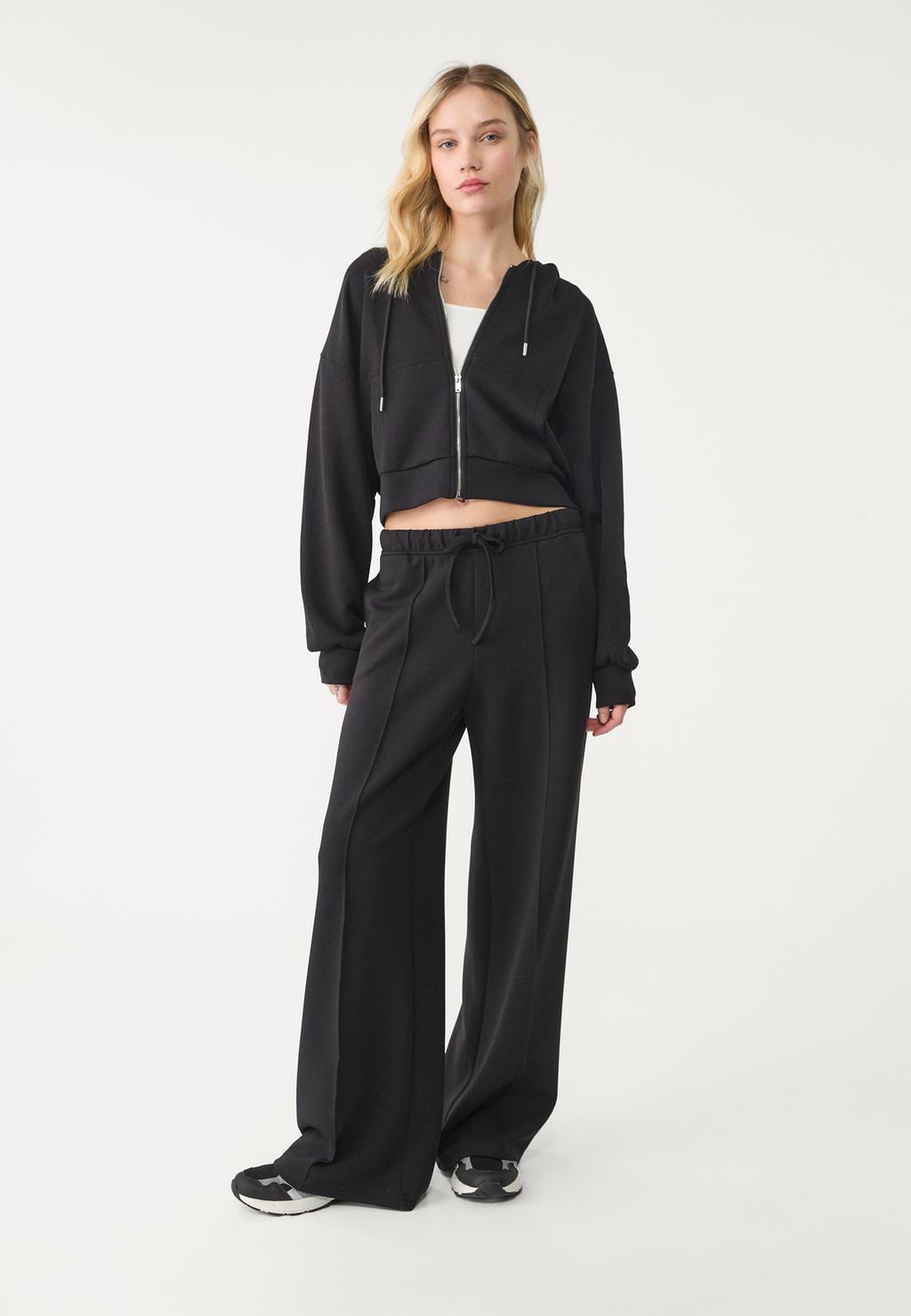 Soft-touch wide-leg trousers with seam detail