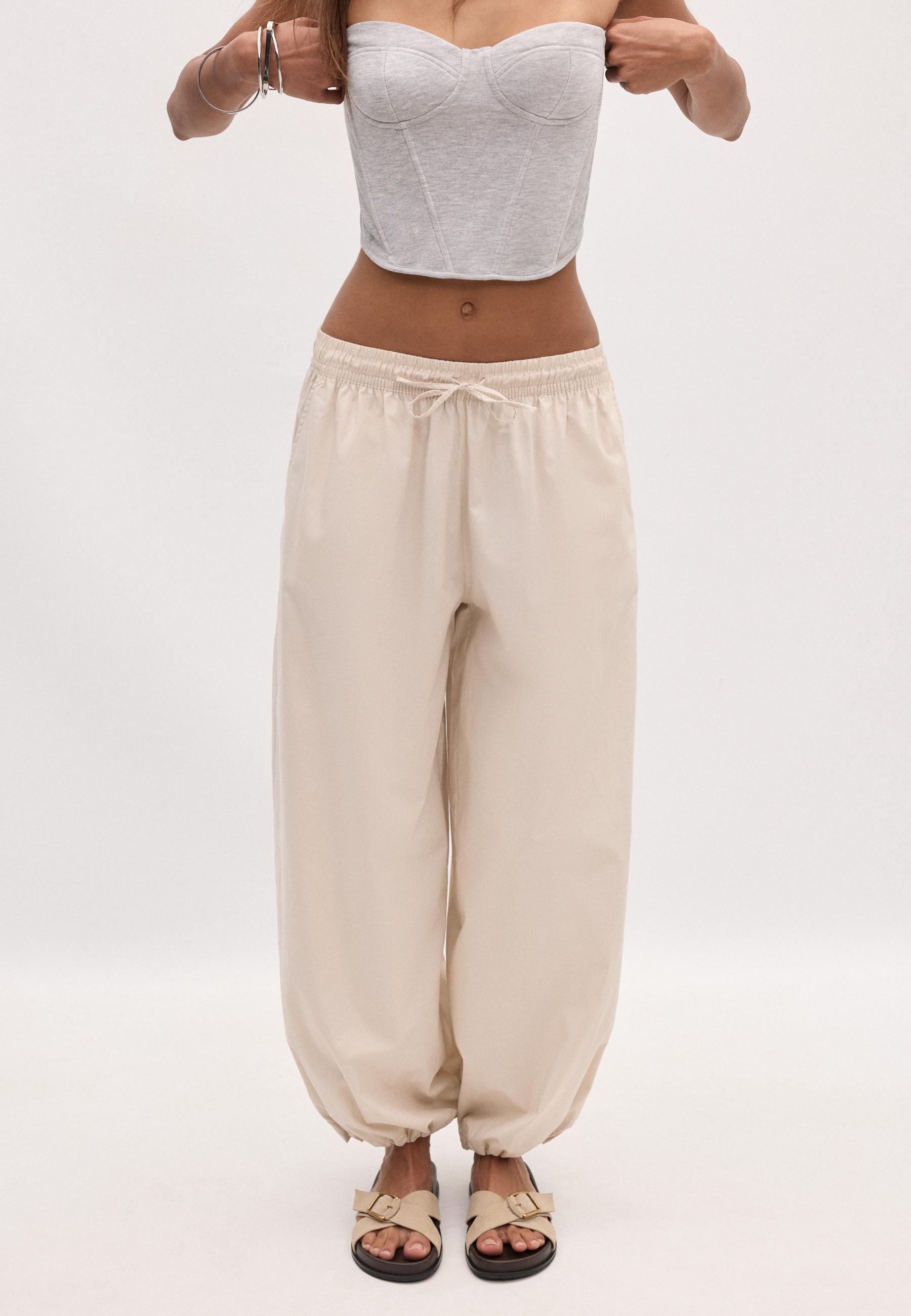 Balloon poplin trousers with stoppers — Stone