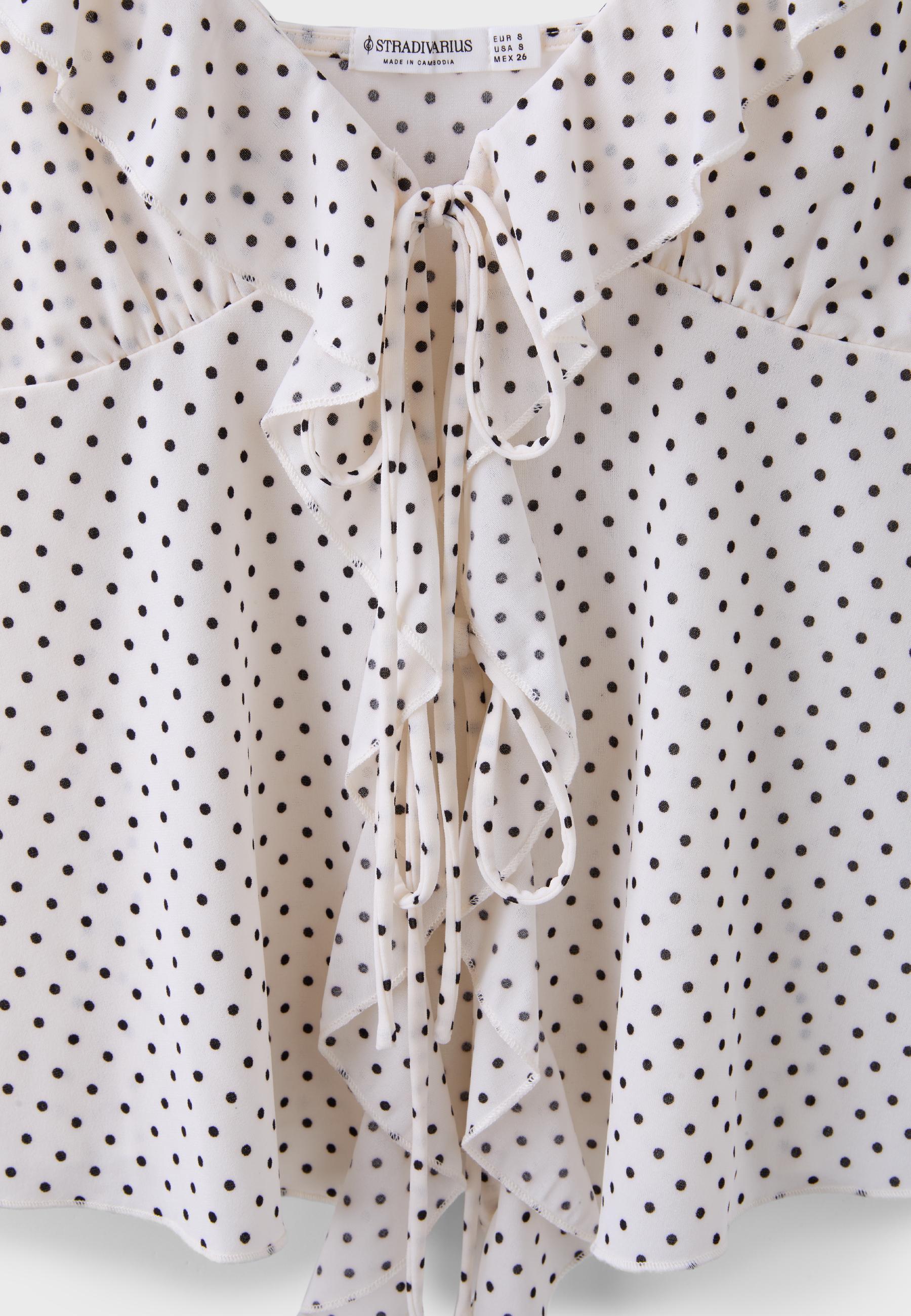 Printed ruffled top — Ecru