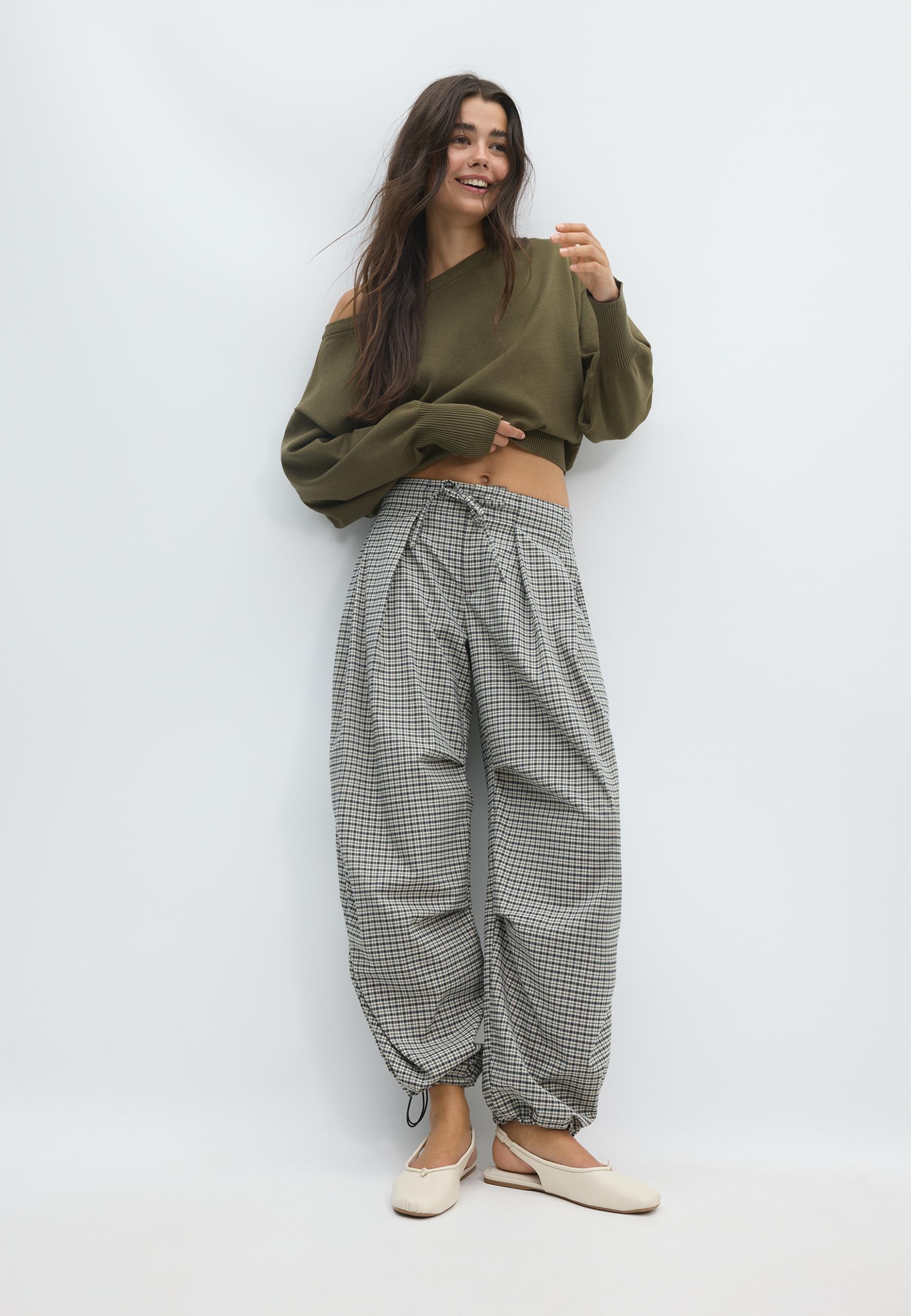 Technical check trousers with pleat detail — Black
