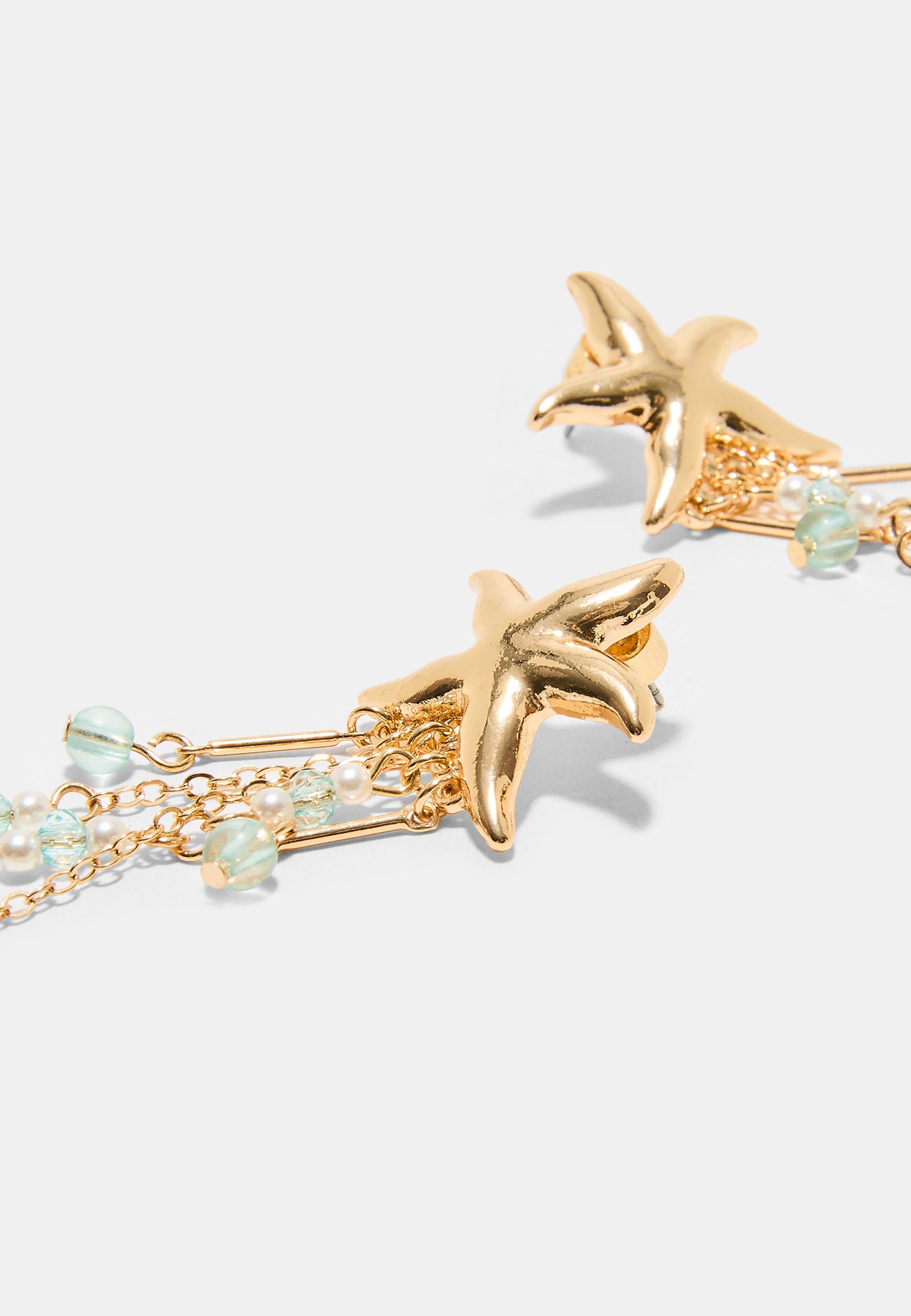Cascading star earrings — Blue