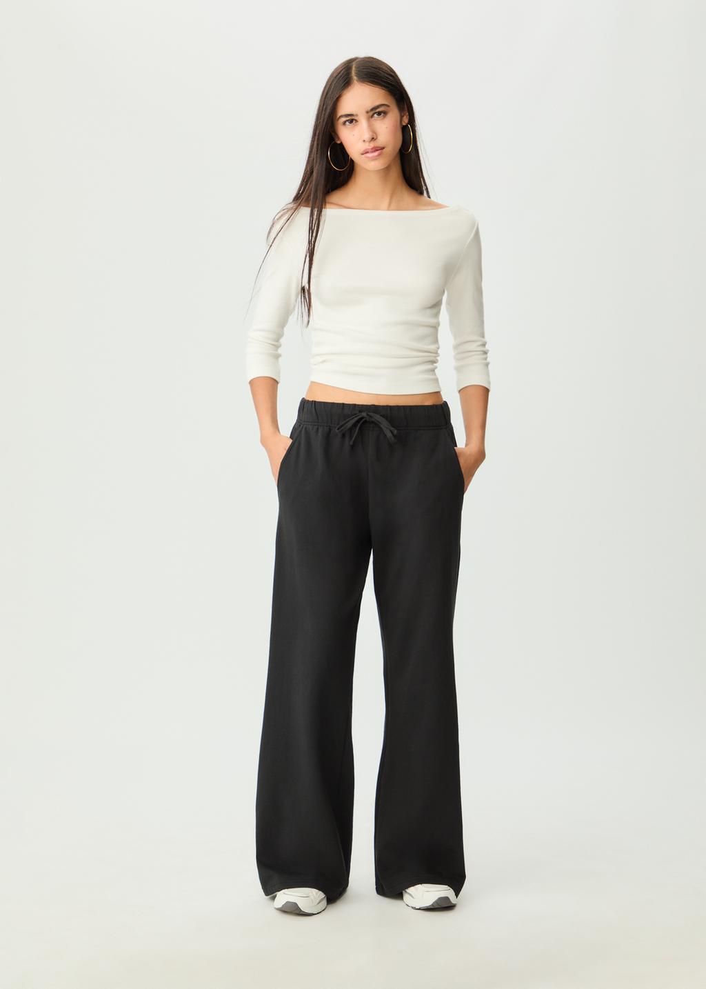 Relaxed fit flared trousers with drawstrings