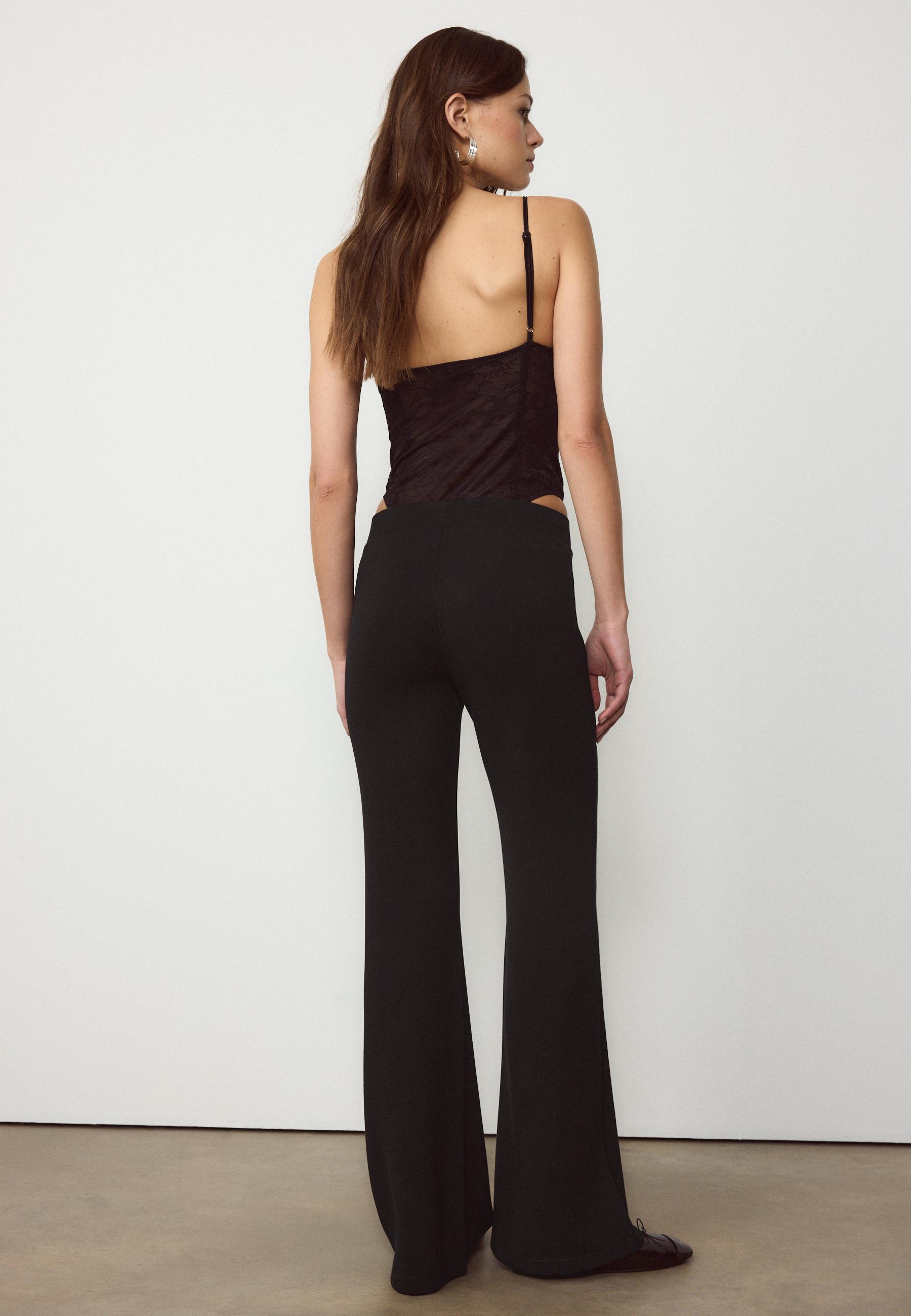 Soft-touch bell bottom trousers with front seam detail — Black