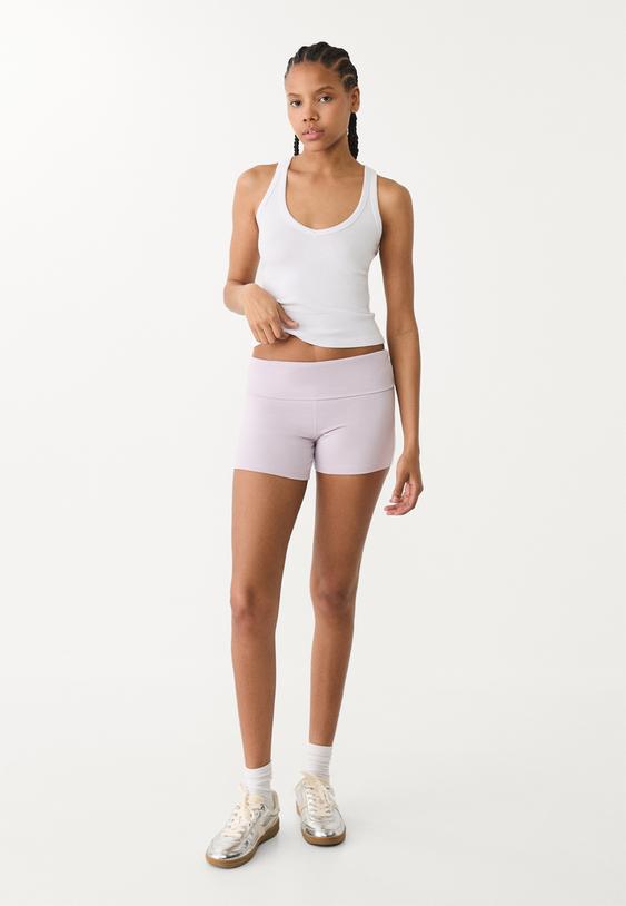 canotta scollo nuotatore con scollo a v