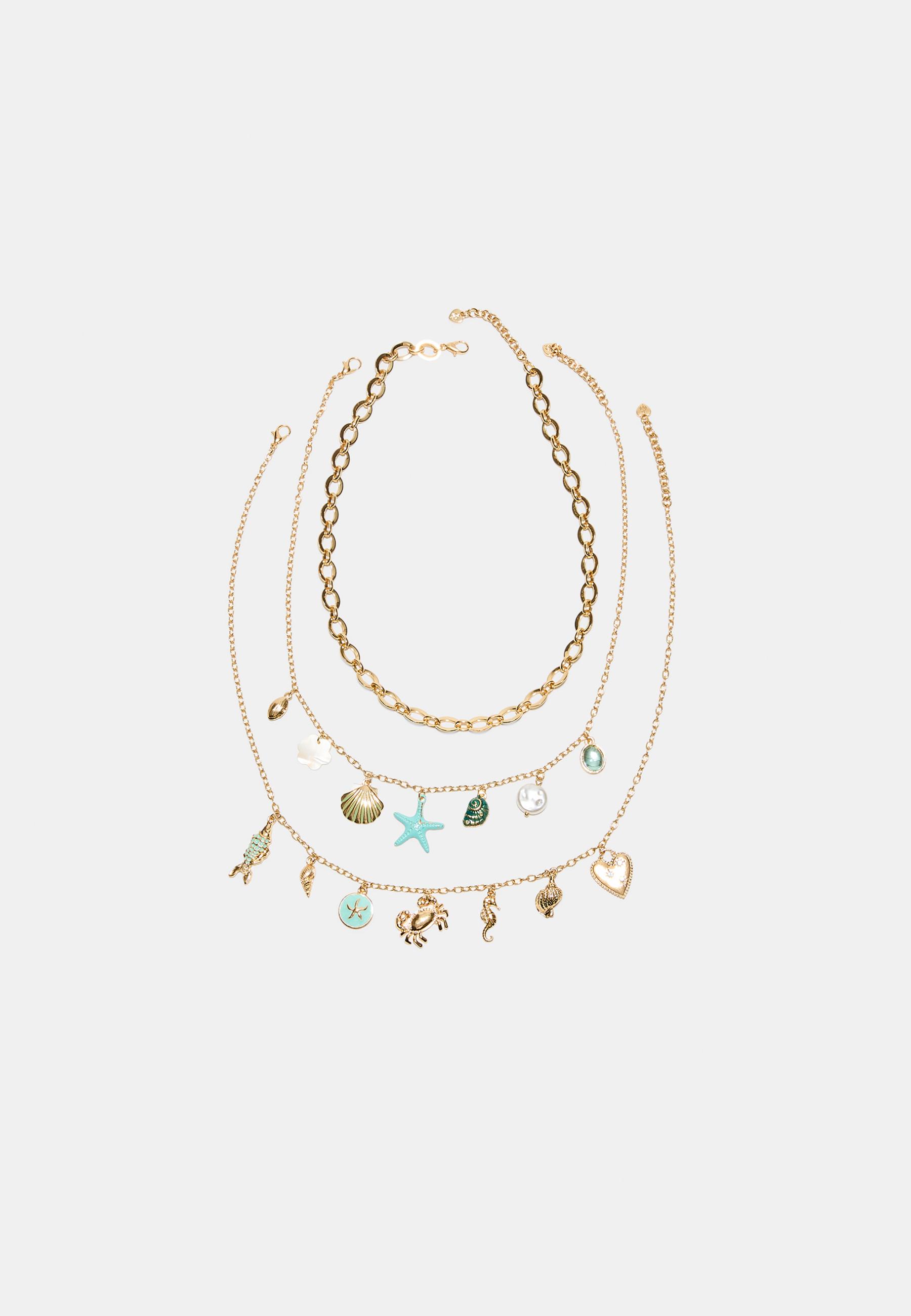 Set of 3 multi-charm sea necklaces — Gold