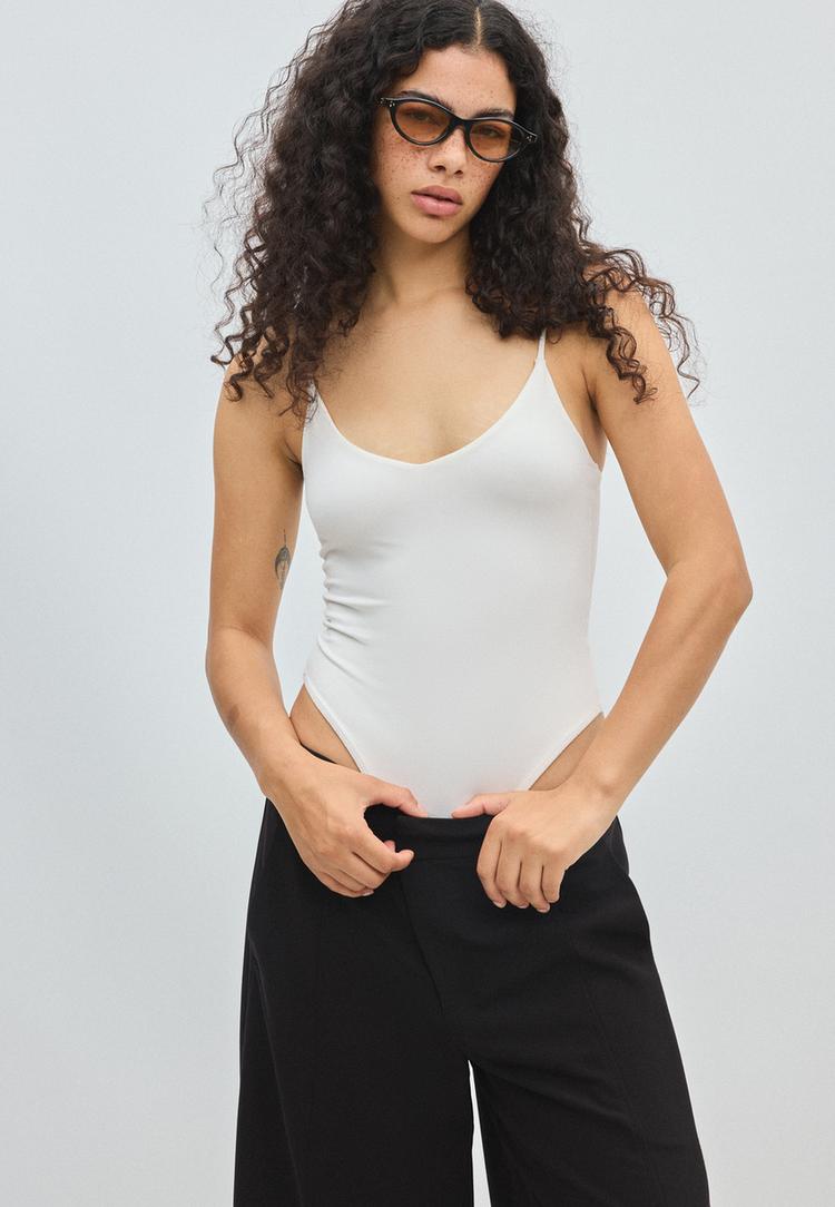 V-neck bodysuit with straps — Ecru