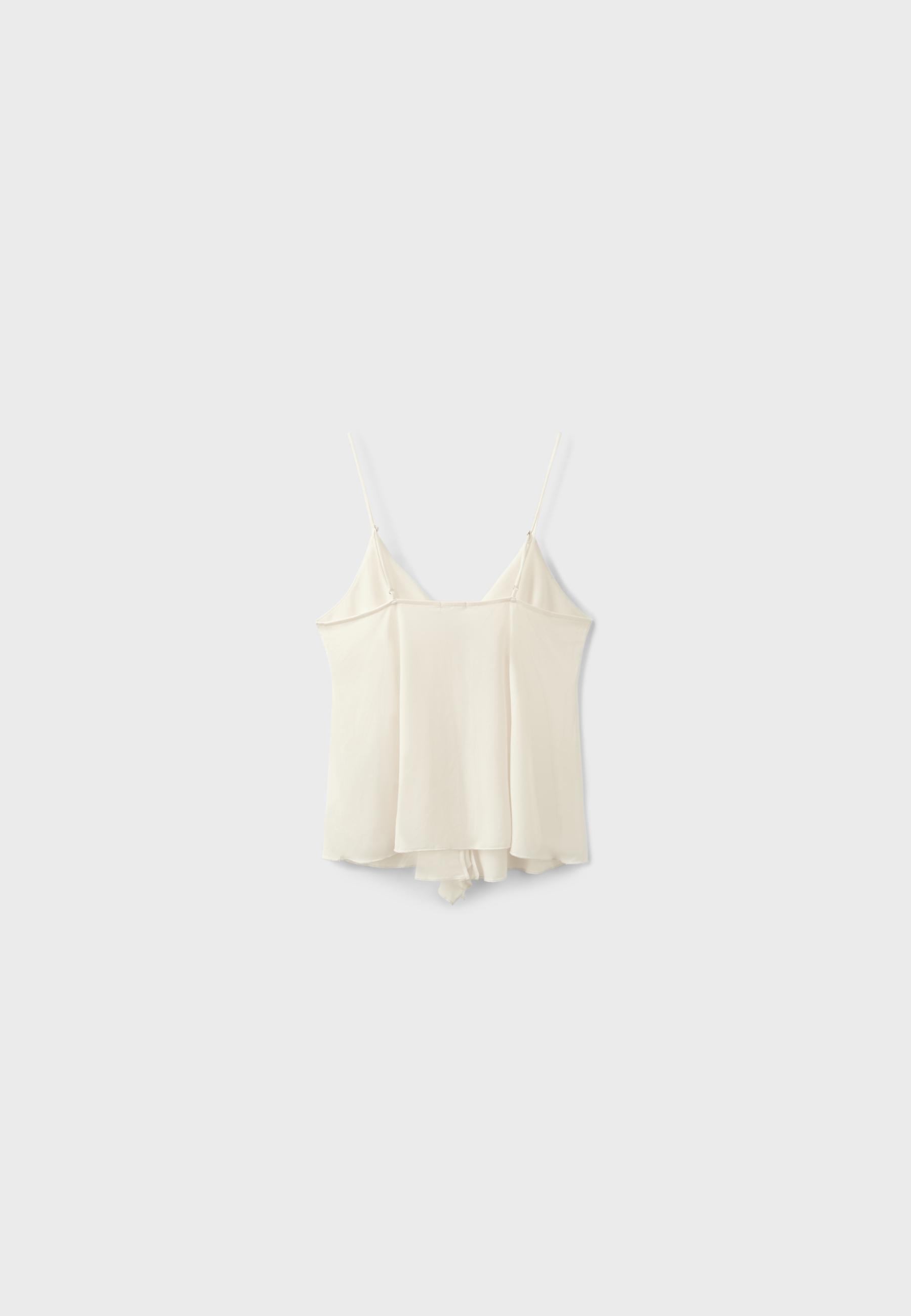 Ruffled strappy top — Ecru