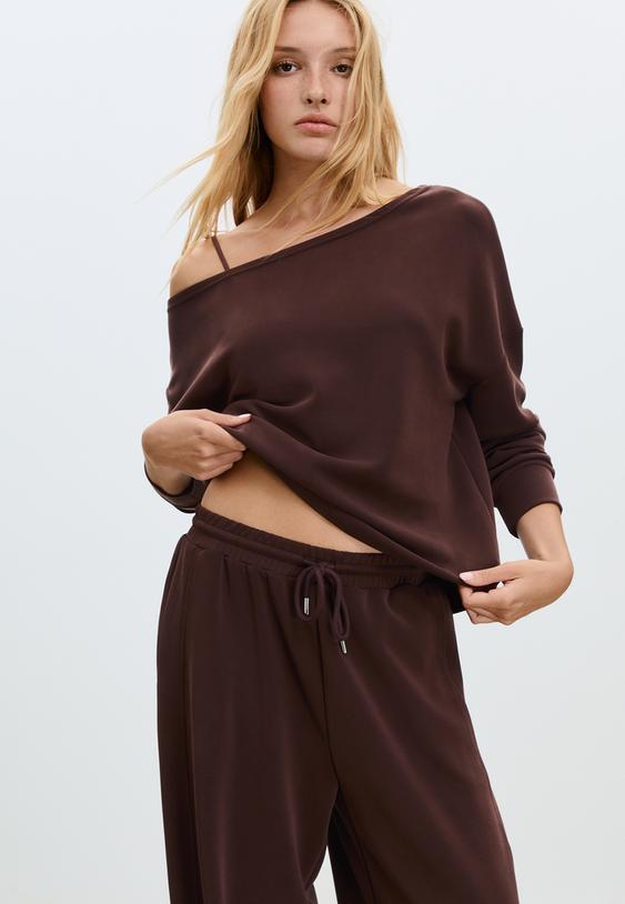 sudadera hombro descubierto tacto suave