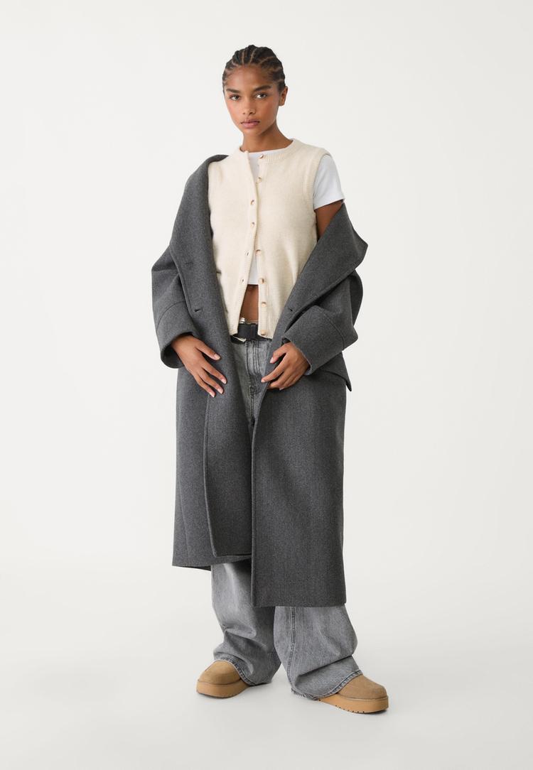 veste sans manches en maille a boutons