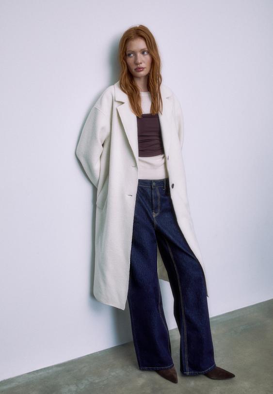 langer-mantel-in-lammfelloptik