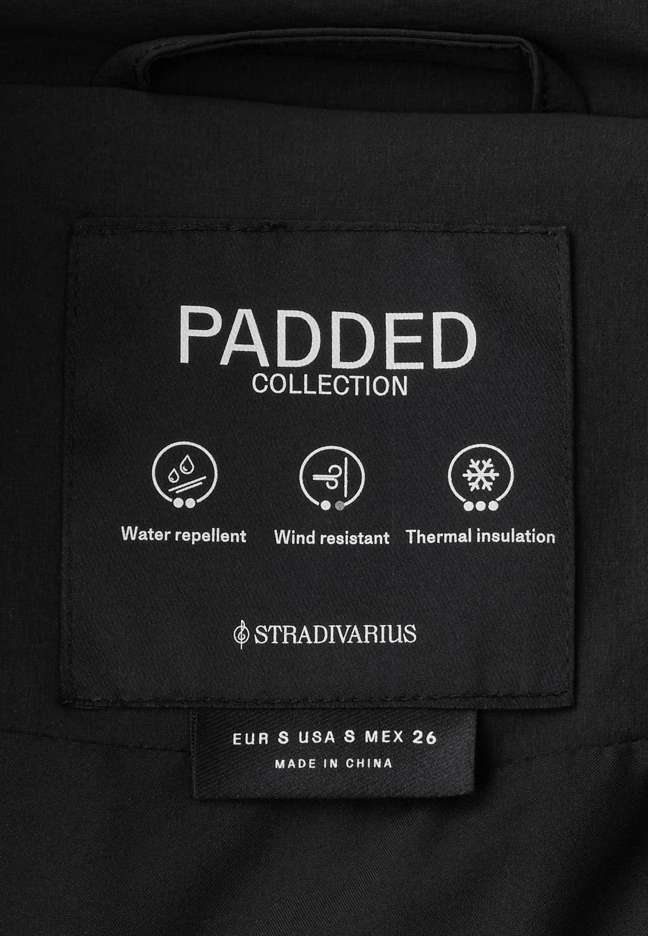 Padded jacket with faux fur hood — Black