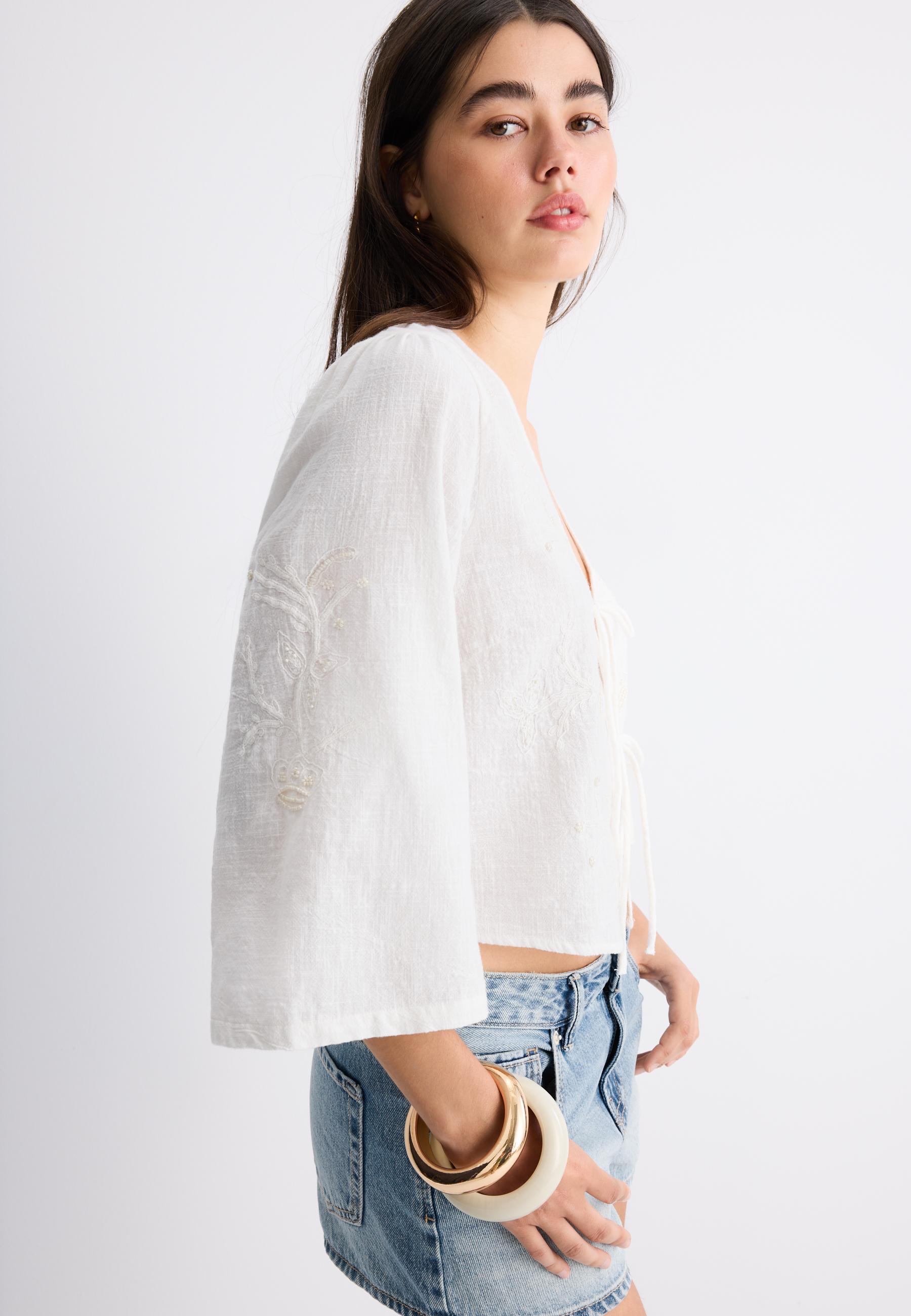 Embroidered faux pearl knot shirt — White
