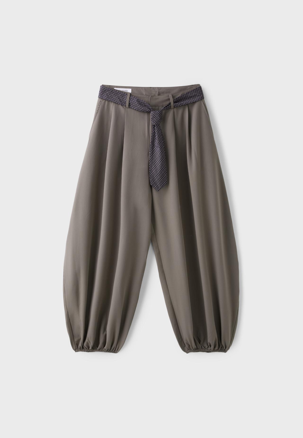 Voluminous sarouel trousers with tie detail — Brown