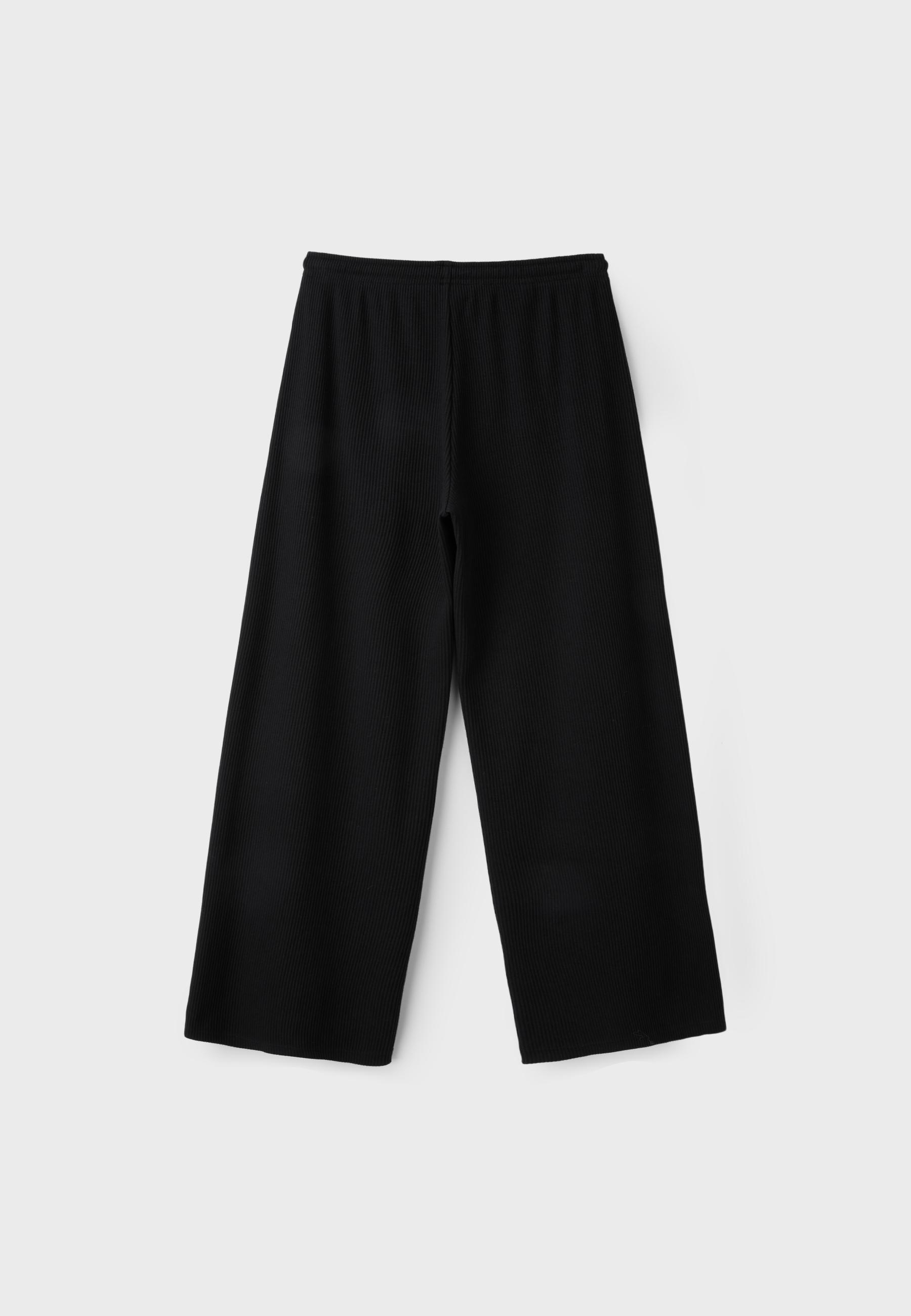 Soft-touch ribbed trousers — Black