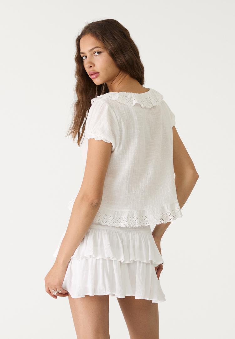 camisa manga corta volantes
