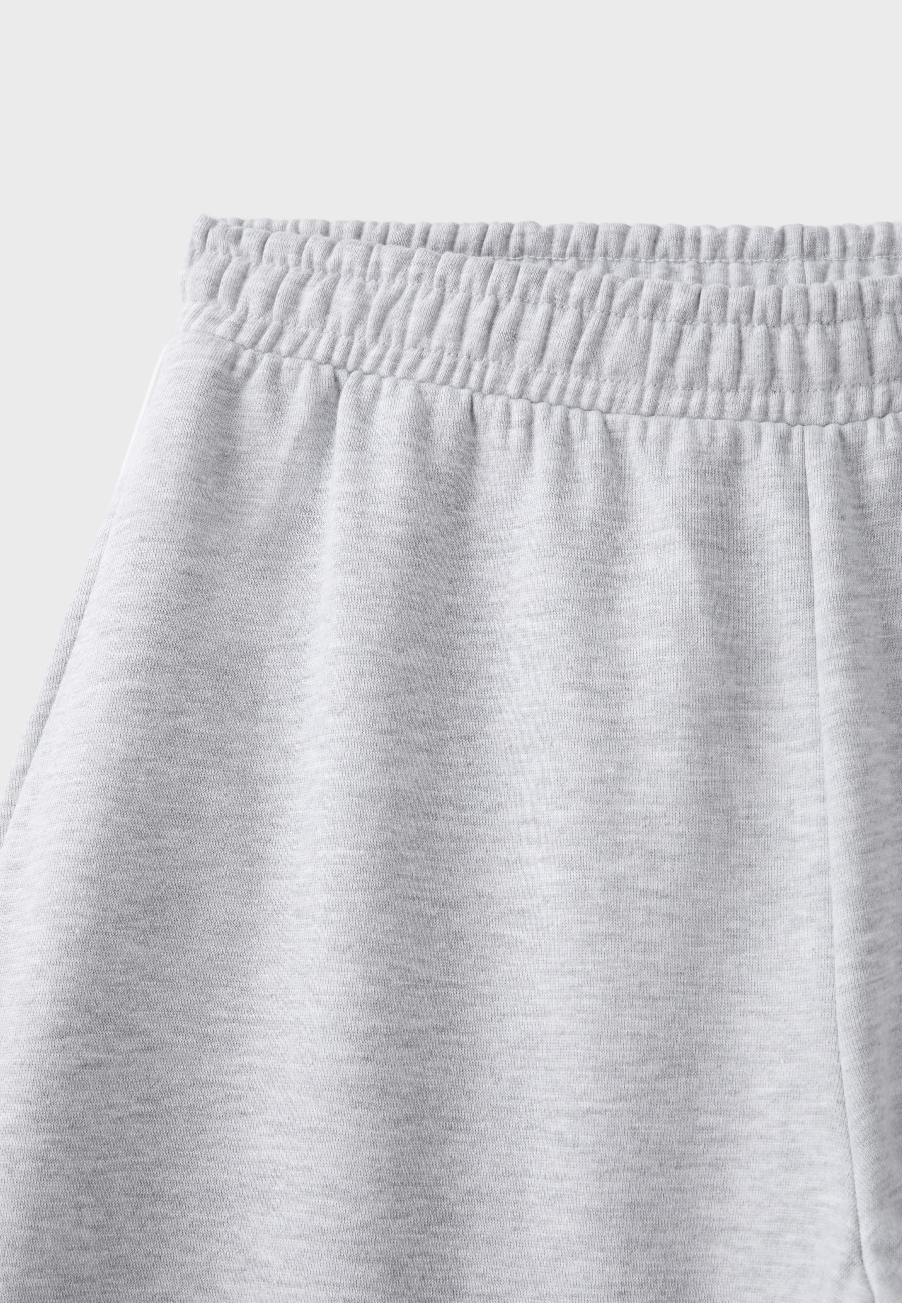 Plush joggers with piping and toggles — Grey melange