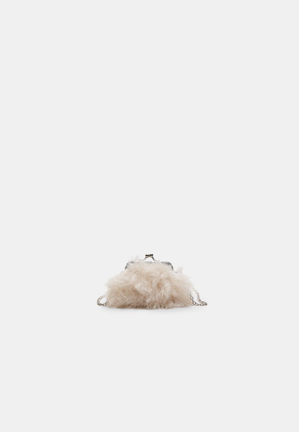 Sac pochette en fausse fourrure
