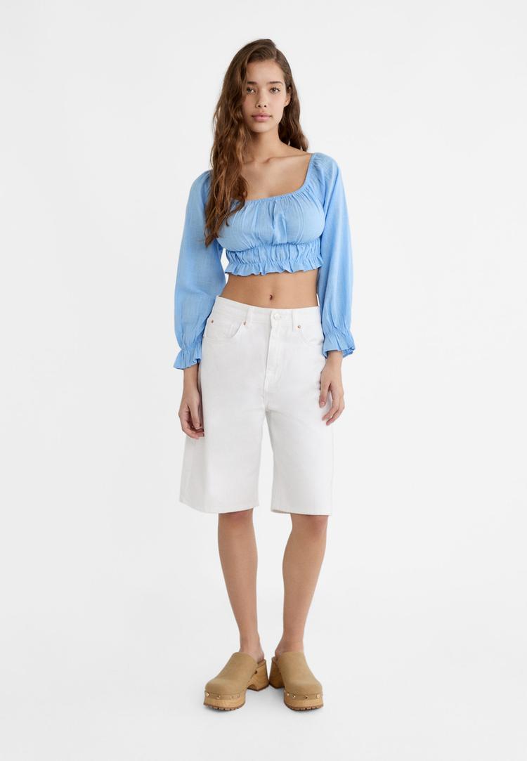 blusa com elasticos e ombros descobertos