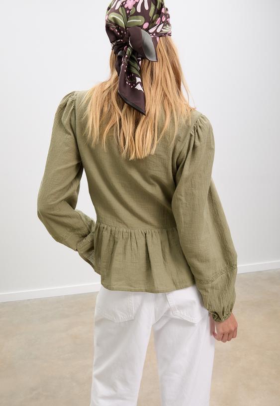 loose fitting embroidered knot blouse