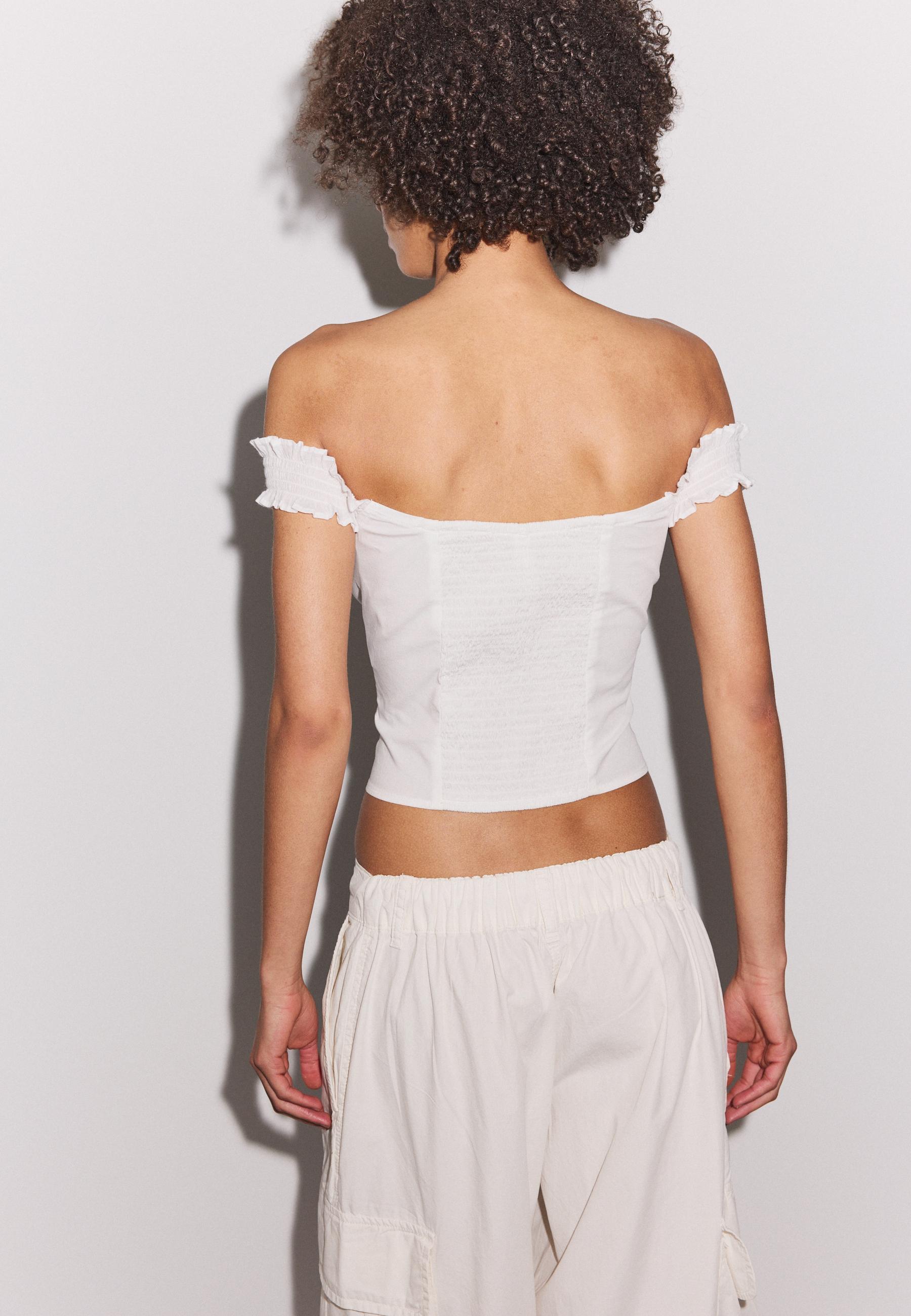 Ruffled corset top — Ecru