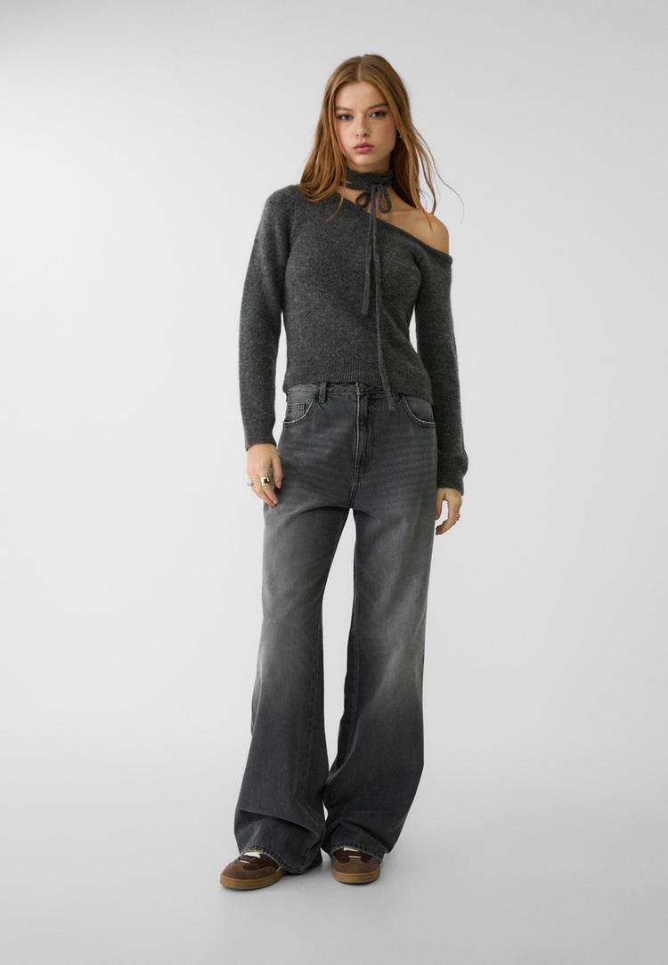 Asymmetric knit sweater with tie detail