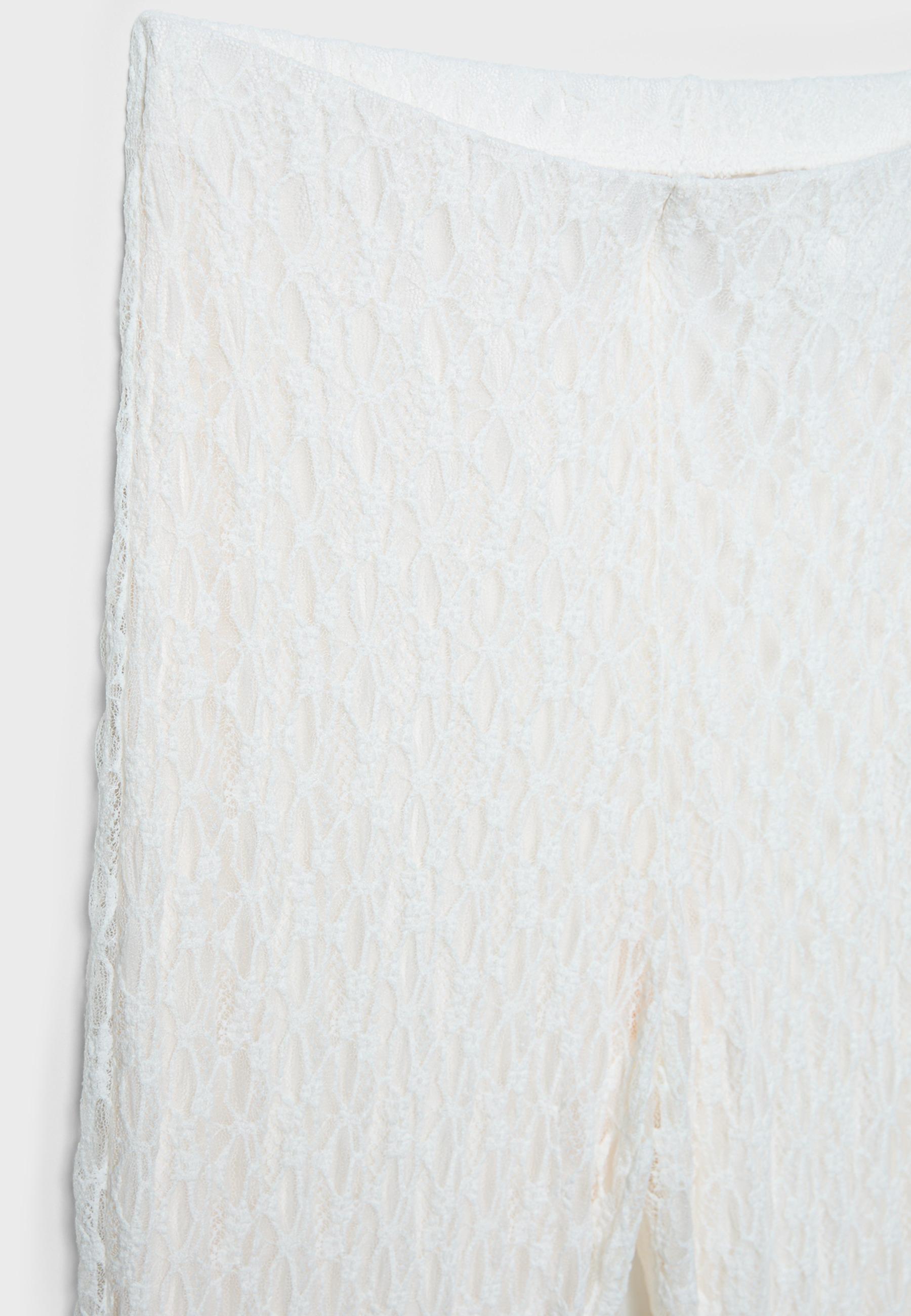 Lace bell bottom trousers — Ecru