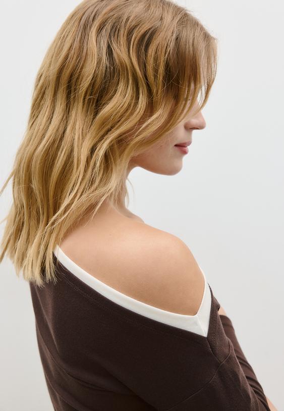 camiseta manga larga asimetrica doble prenda