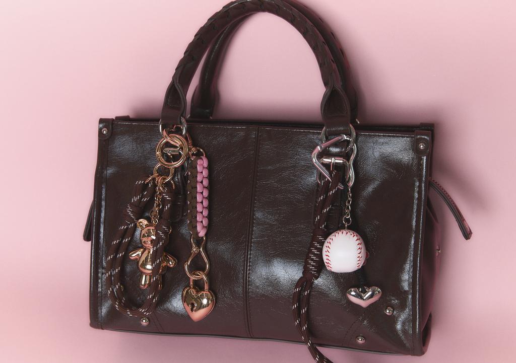 Medium crossbody bag with a braided strap.