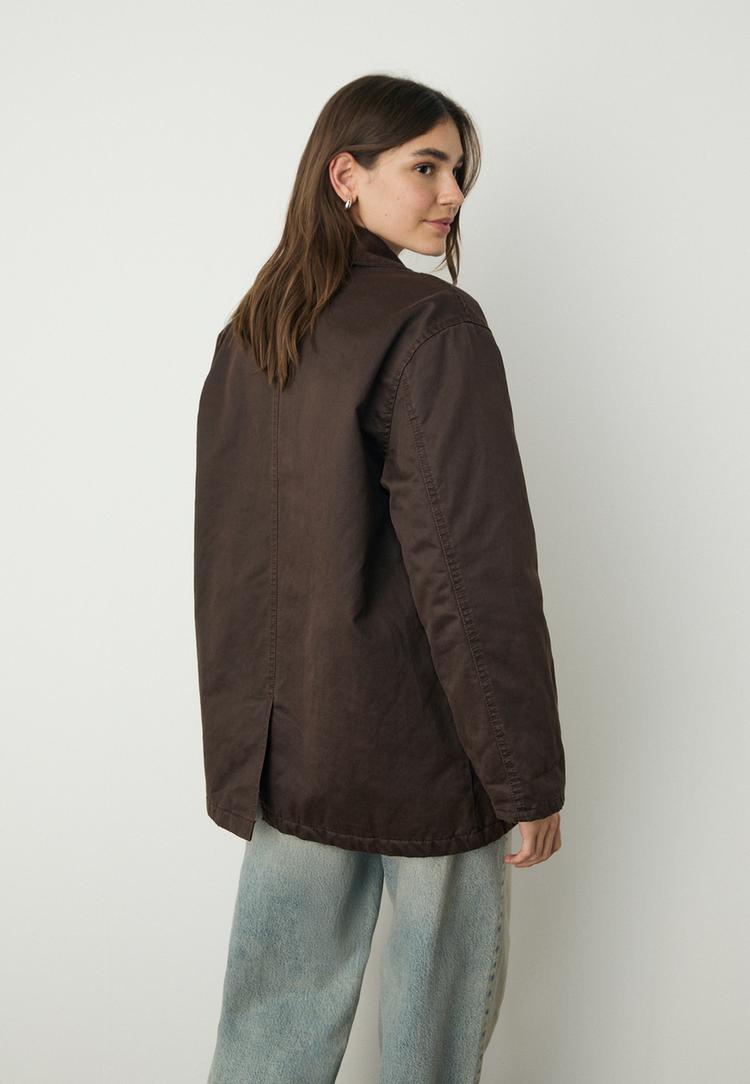 parka encerada multi bolsillos