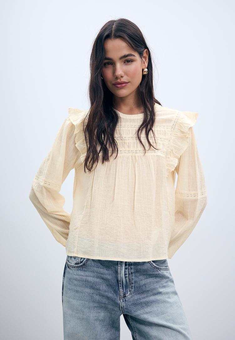 ruffled blouse with lace trim