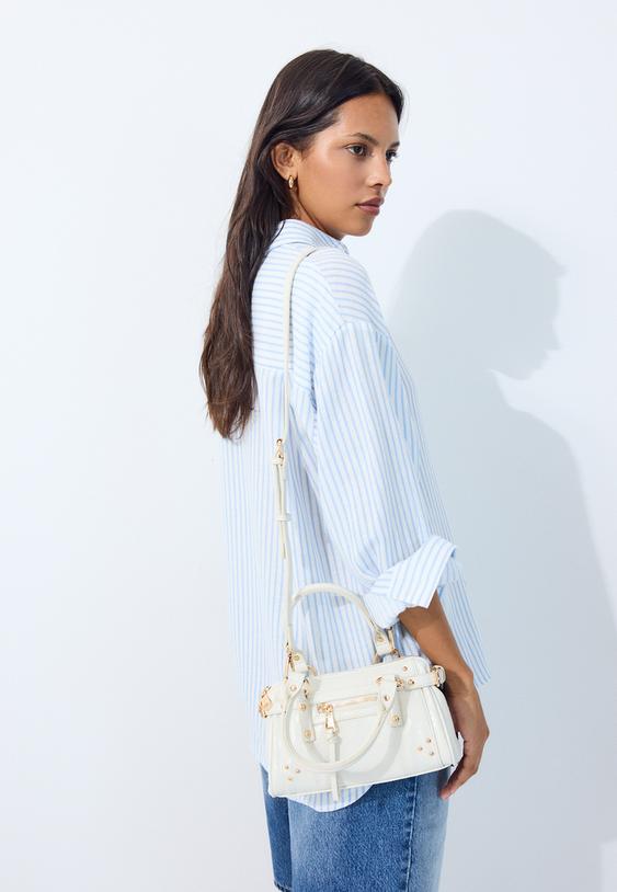 umhangetasche-mit-nieten-und-tasche