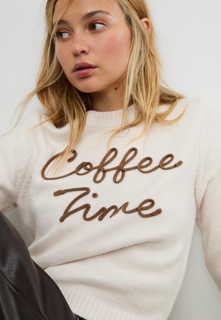 pull maille texte positionnel