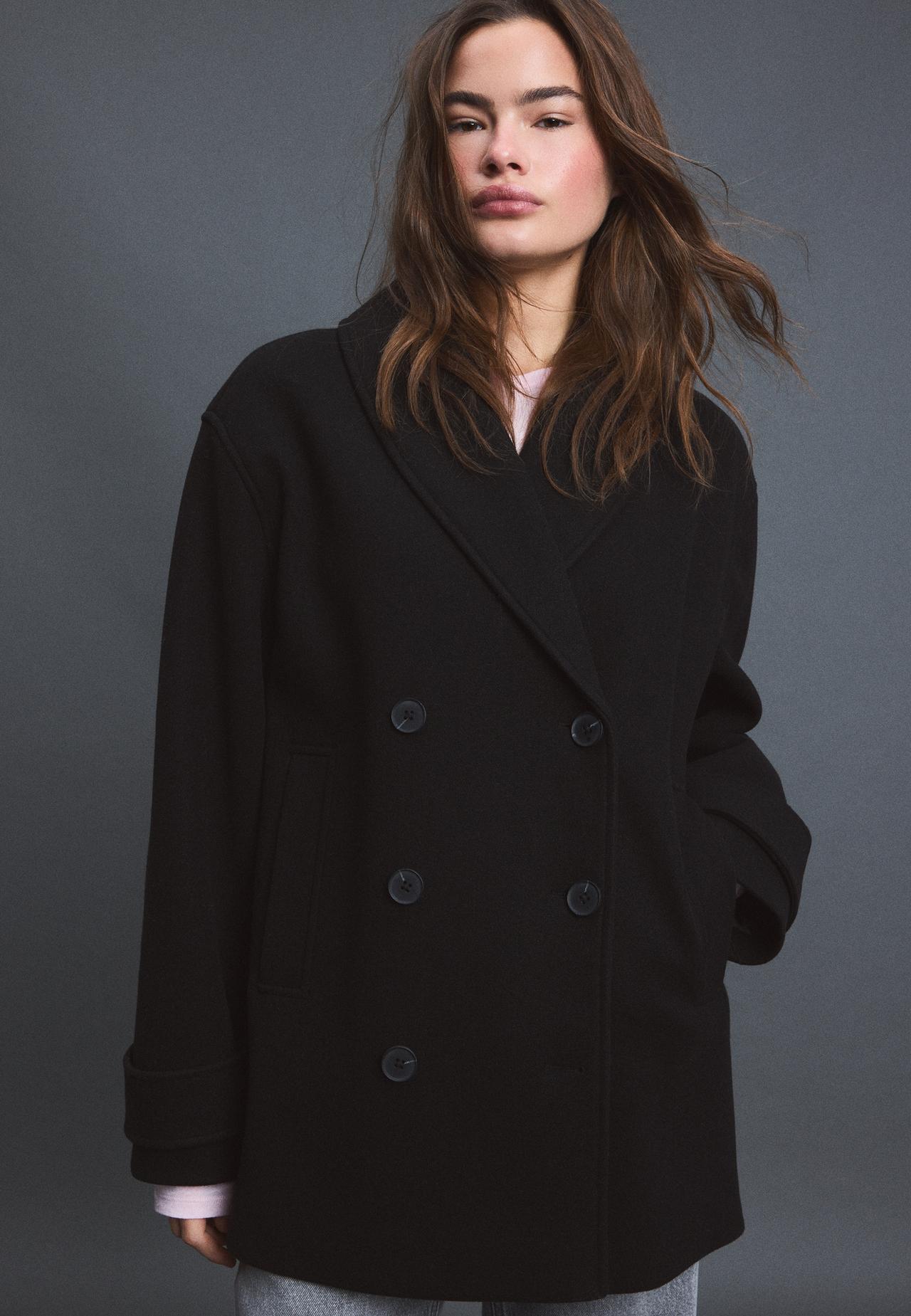 Soft-touch crossover high neck jacket — Black