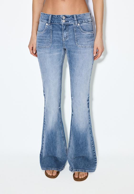 jeans de cintura baixa com bolso e costura