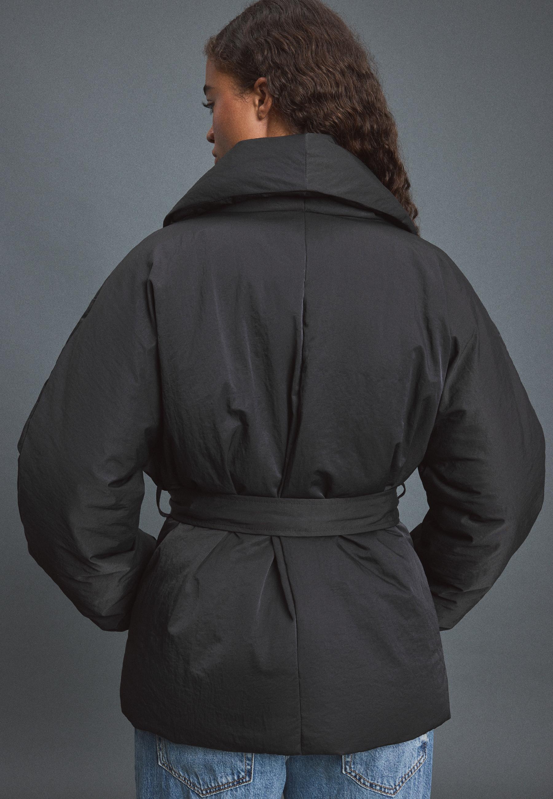 Padded jacket with shawl neck and belt — Black