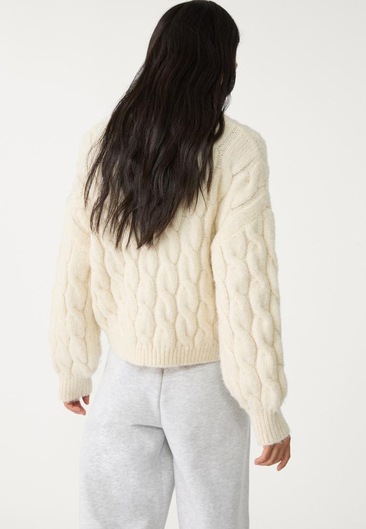 pull cropped en maille tressee