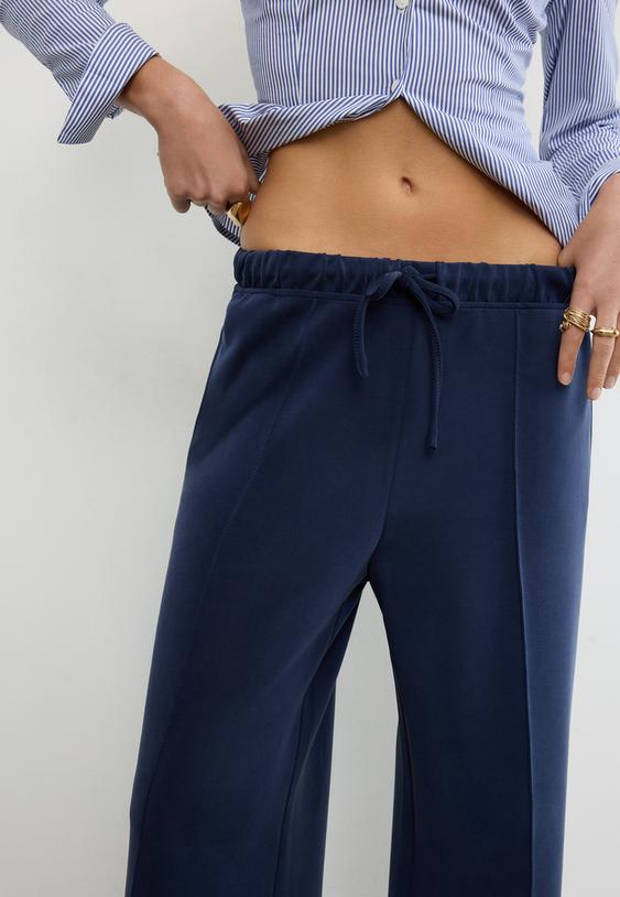 yumusak dokulu dikis detayl genis paca jogger pantolon