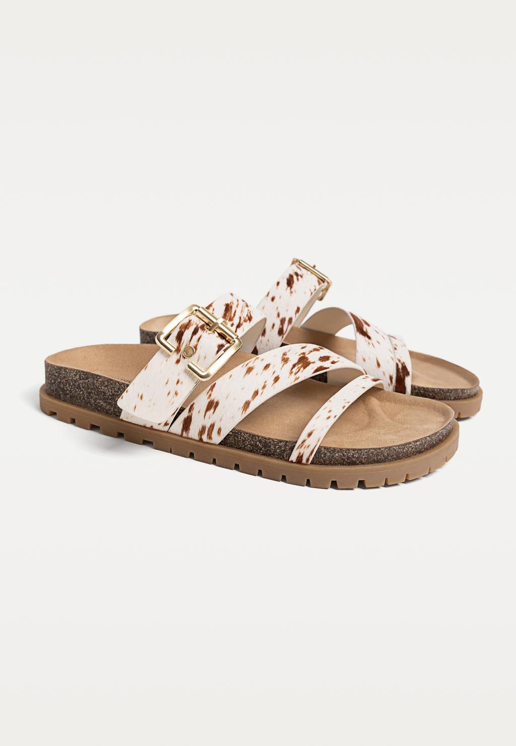 Sandalias planas piel efecto pelo