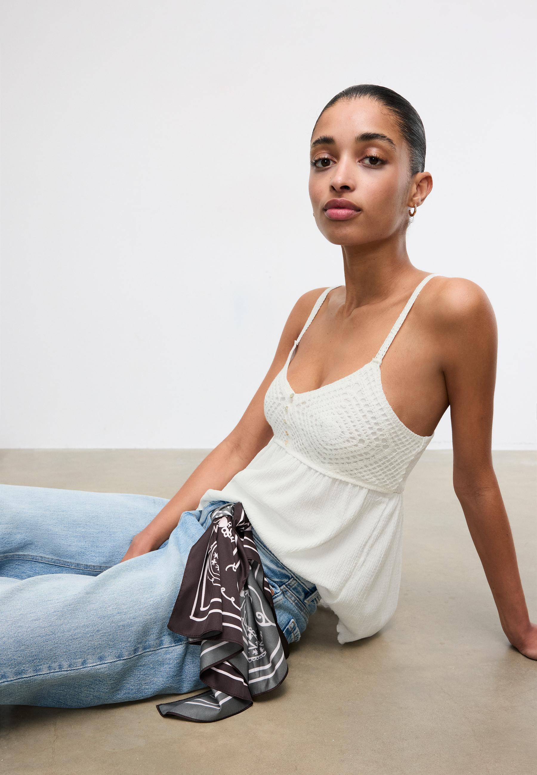 Ruffled crochet top — White