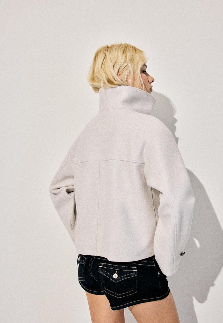 cazadora cruzada cuello alto efecto suave