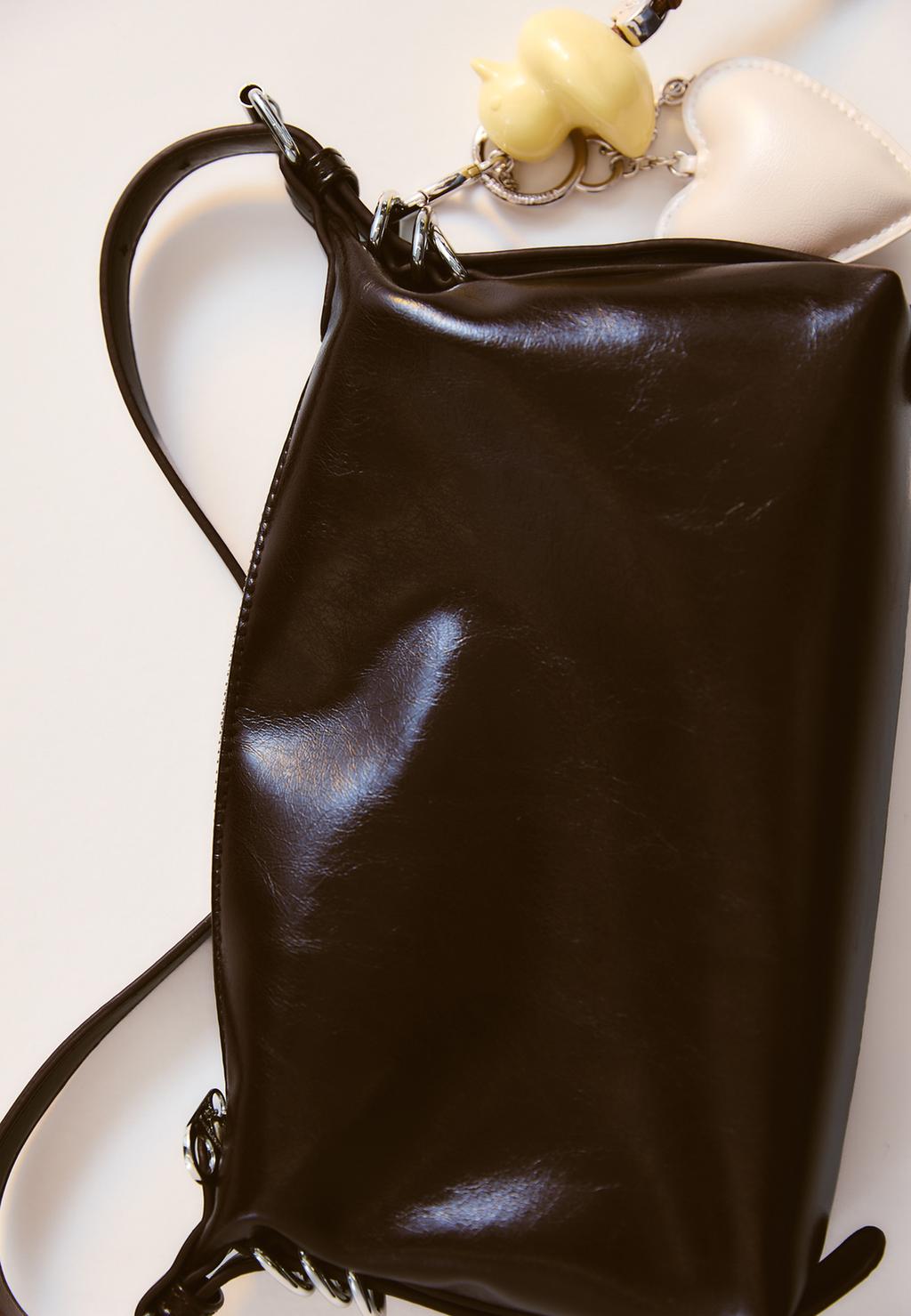 Shoulder bag with strap detail