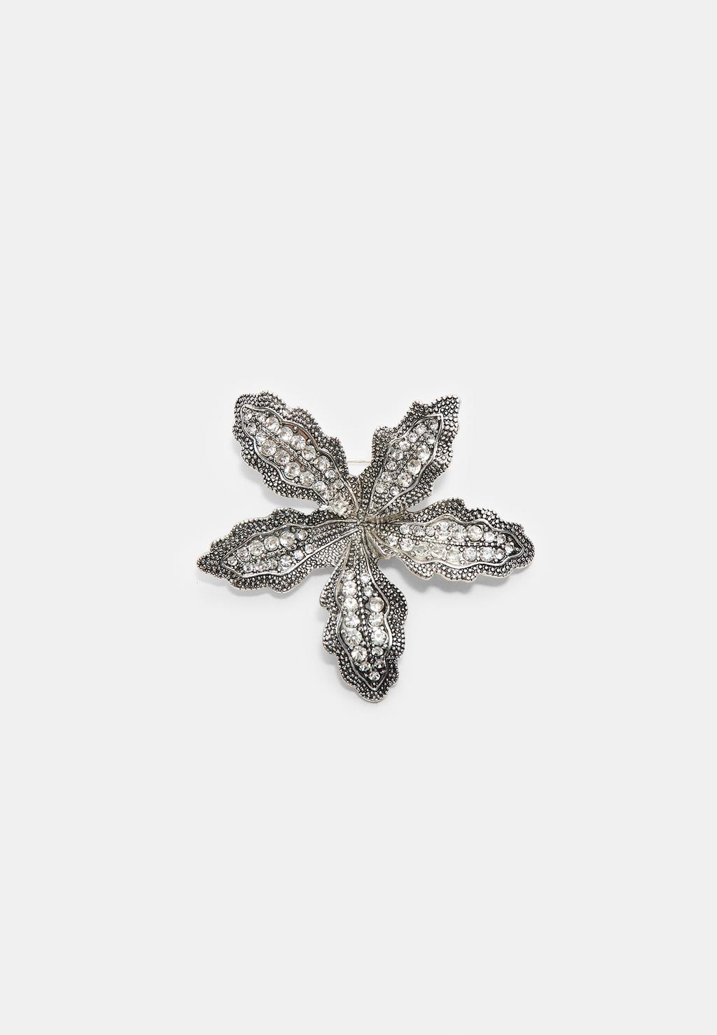 Broche flor brillos