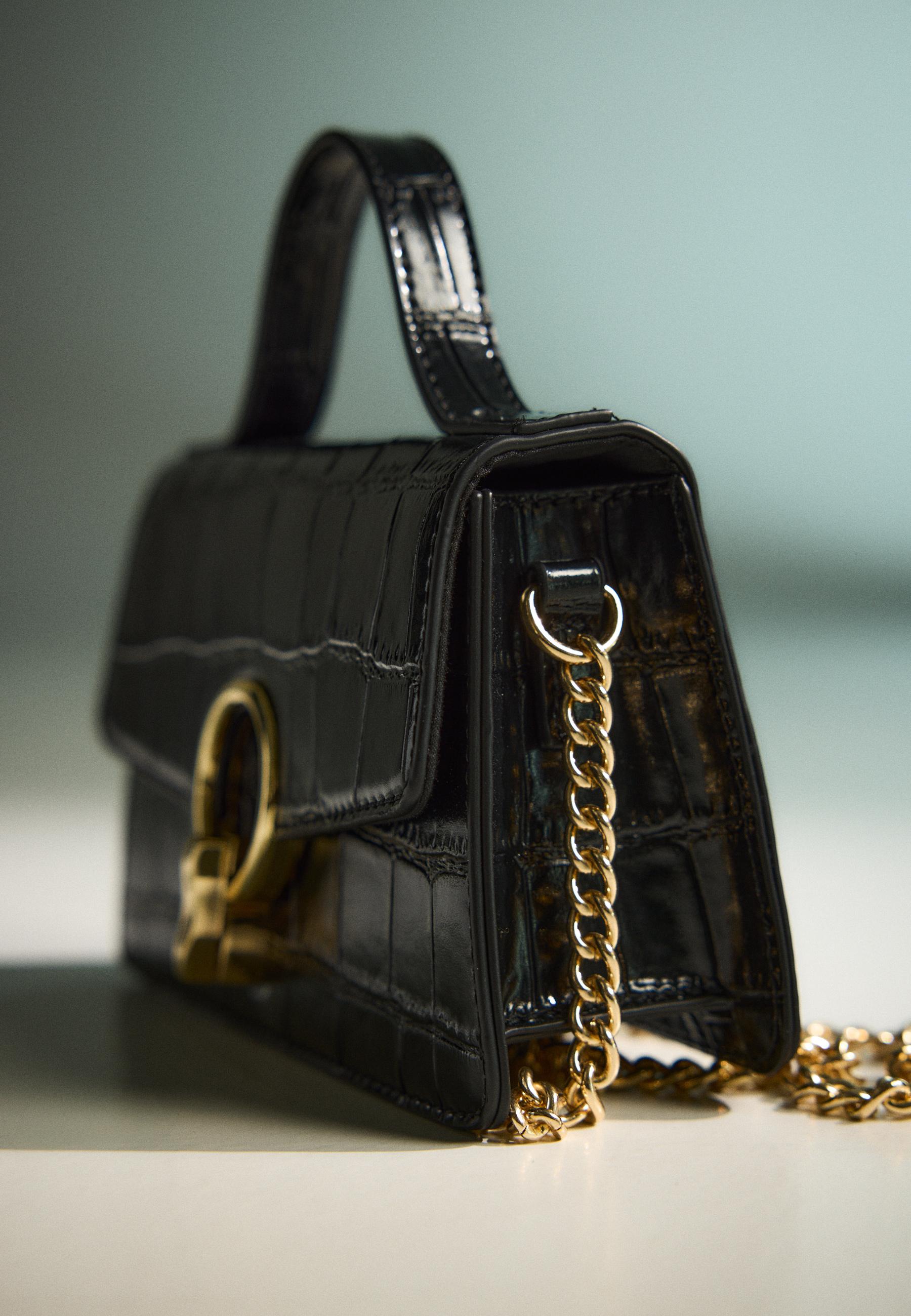Coconut effect round clasp shoulder bag — Black