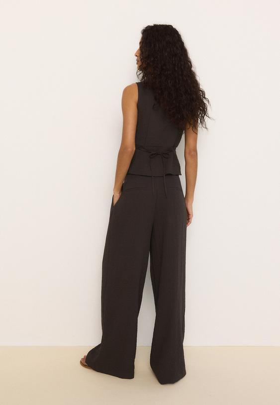 pantaloni ampi con bottoni regolabili misto lino