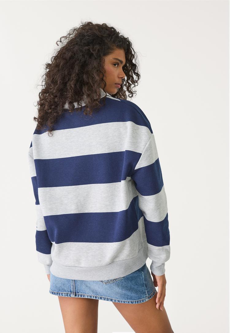 sudadera polo rayas bordados